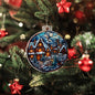 Beautiful Acrylic Ornament with a Stained Glass Look of: Vintage Village with Santa flying over moon